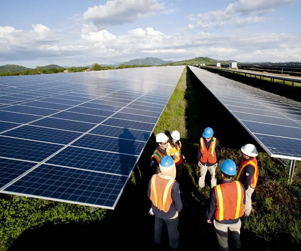 Maintenance workers at the Agua Fria Solar Plant in Honduras.