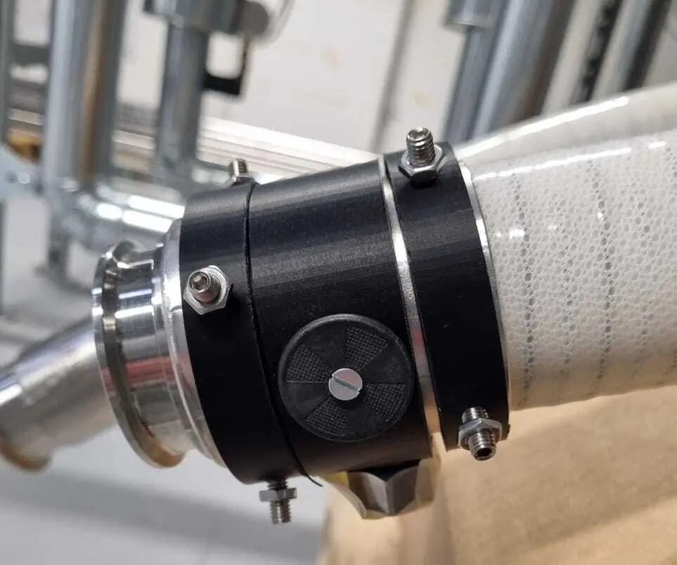 Engelhard: The image shows the prototype of the RFID tag holder. The stainless steel design is used in production operations.