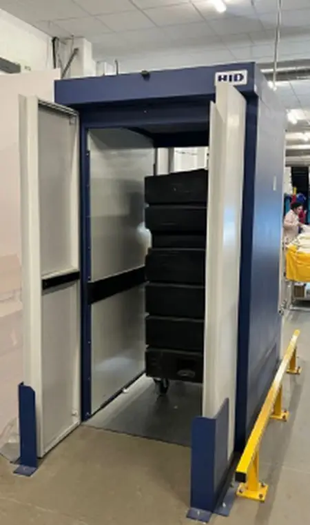 HID RFID cabinet station batch-scans full loads, feeding Acuity in seconds.